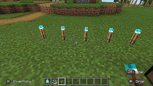 A set of blue flame soul torches in Minecraft.