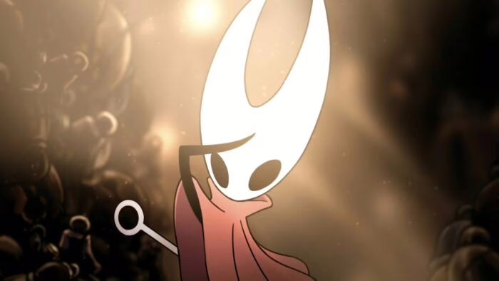 Personaje de Hollow Knight Silksong con fondo oscuro y luz brillante