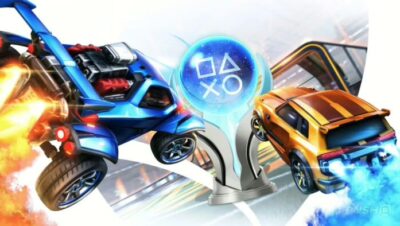 Dos coches de Rocket League compitiendo junto a un trofeo platino
