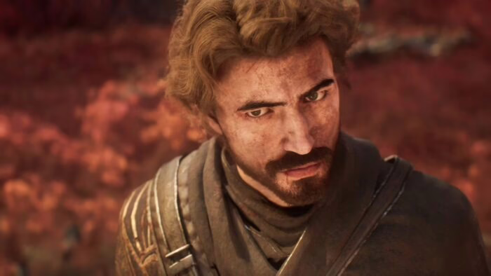 Personaje masculino del juego Expedición 33 con expresión seria